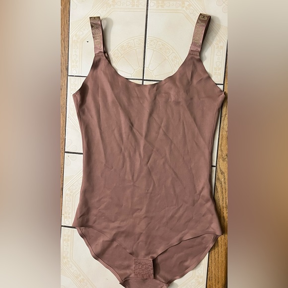 Juicy Couture Tops - Juicy Couture Mauve Seamless Bodysuit